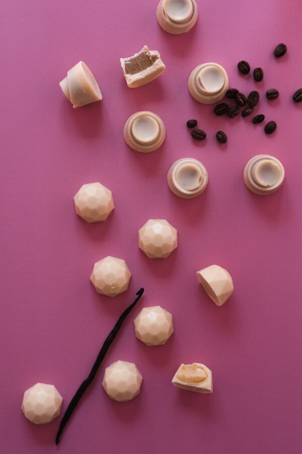 White chocolate with pink background for Valentine's Day