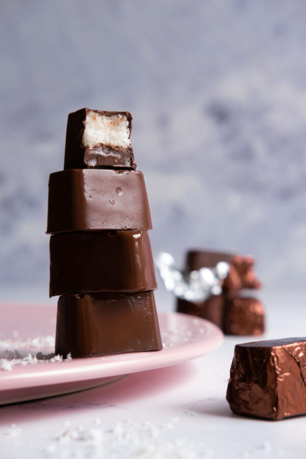 Vegan coconut chocolate on pink plate