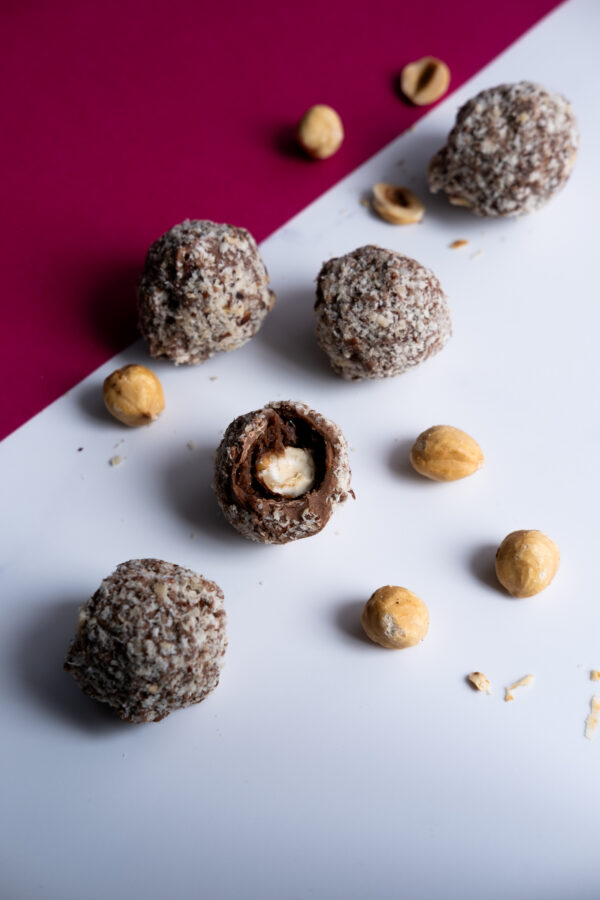 Sugar-free hazelnut chocolate on white and pink surface