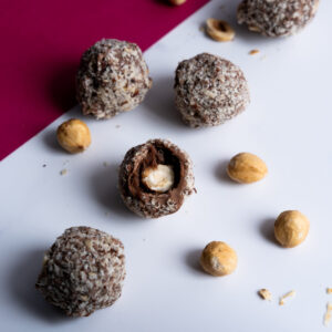 Sugar-free hazelnut chocolate on white and pink surface