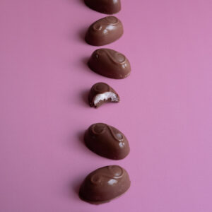 coconut nibble on light pink table